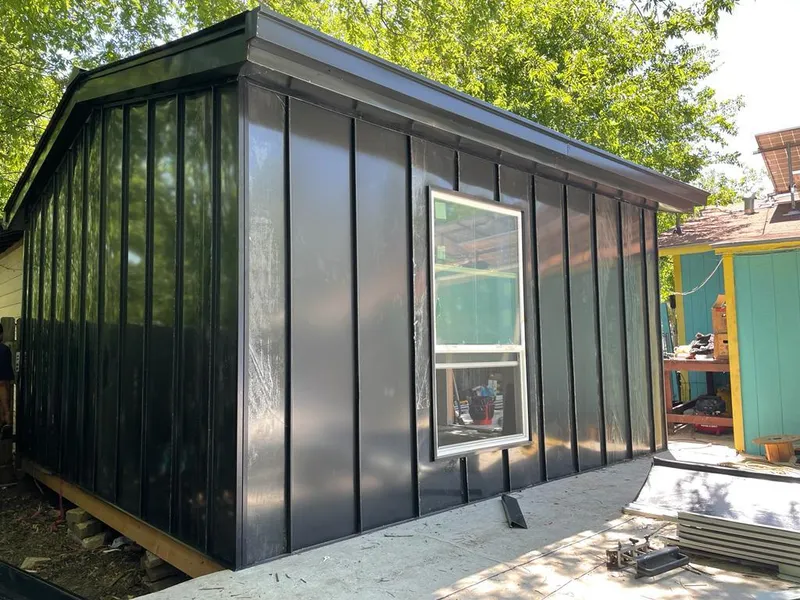 Black standing seam metal wall panels for Metal Roof Installation in Wapakoneta